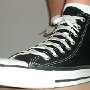 New Black High Top Chucks  Wearing new black high tops, angled outside view.