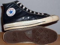 Black Leather High Top Chucks  Black leather high tops, inside patch and sole views.