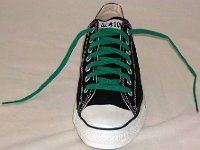 Black Low Cut Oxford Chucks  Brand new black low cut with kelly green laces, front and top views.