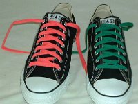 Black Low Cut Oxford Chucks  Brand new black low cuts with neon pink and kelly green laces, front and top views.