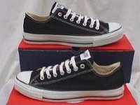 Black Low Cut Oxford Chucks  Brand new black low cuts with straight laces and box, side views.