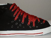 Black and Red Multiple Eyelet High Top Chucks  Outside view of a right black and red multiple eyelet high top.
