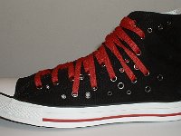 Black and Red Multiple Eyelet High Top Chucks  Outside view of a left black and red multiple eyelet high top.