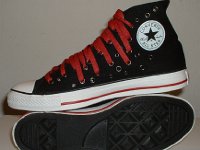 Black and Red Multiple Eyelet High Top Chucks  Inside patch and sole views of black and red multiple eyelet high tops.
