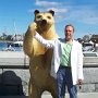 People Wearing Black Chucks  Hanging with a bear.