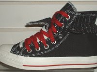 Black and Red Pinstripe Double Upper High Top Chucks  Outside view of a left black, red, and white double upper high top, with the outer upper rolled down.
