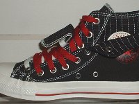 Black and Red Pinstripe Double Upper High Top Chucks  Inside patch view of a right black, milk, and red double upper high top, with the outer upper rolled down.