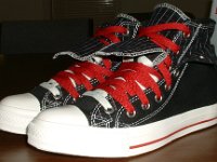 Black and Red Pinstripe Double Upper High Top Chucks  Angled side view of black, red, and milk double upper high tops, with the outer upper rolled down.