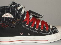 Black and Red Pinstripe Double Upper High Top Chucks  Inside patch view of a left black, red, and milk double upper high top, with the outer upper rolled down.
