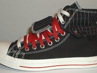 Black and Red Pinstripe Double Upper High Top Chucks  Outside view of a left black, red, and white double upper high top, with the outer upper rolled down.