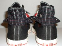 Black and Red Pinstripe Double Upper High Top Chucks  Rear view of black, red, and milk double upper high tops, with the outer upper rolled down.