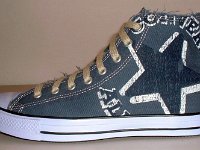 Blue Denim Distressed Graphic Star High Top Chucks  Left denim blue graphic star high top, outside view.