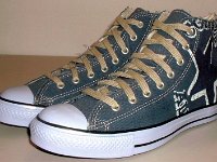 Blue Denim Distressed Graphic Star High Top Chucks  Blue denim graphic star high tops, angled side view.