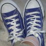 Blue High Top Chucks  Wearing royal blue high tops with triangle lacing, top view.