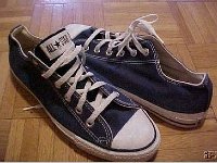 Blue Low Cut Chucks  Navy blue low cuts, angled front and rear views