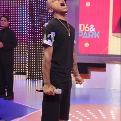Bow Wow  Bow Wow performing in black high top chucks.