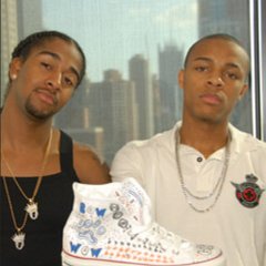 Bow Wow  Bow Wow and Omarion posing with an optical white high top chucks they decorated.