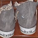 Brad Deniston Collection of Chucks  Rear view of distressed black denim high tops with hemp shoelaces.