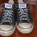 Brad Deniston Collection of Chucks  Rear view of black hemp low cut chucks with checkered laces.