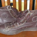 Brad Deniston Collection of Chucks  Inside patch views of brown leather Euro high tops.