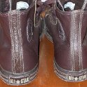 Brad Deniston Collection of Chucks  Rear view of brown leather Euro high tops.