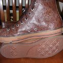 Brad Deniston Collection of Chucks  Inside patch and sole views of brown leather high tops.