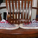Brad Deniston Collection of Chucks  Side views of black and white checkered low cut chucks.