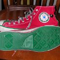 Brad Deniston Collection of Chucks  Inside patch and sole views of red and green Christmas high tops