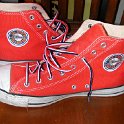 Brad Deniston Collection of Chucks  inside patch views of red Fullerton College high tops.