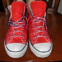 Brad Deniston Collection of Chucks  Front view of red Fullerton College high tops.