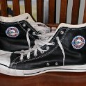 Brad Deniston Collection of Chucks  inside patch views of black Fullerton College high tops.