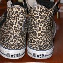 Brad Deniston Collection of Chucks  Rear view of leopard print high tops.