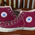 Brad Deniston Collection of Chucks  Inside patch views of maroon high tops.