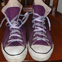 Brad Deniston Collection of Chucks  Front view of purple Laker high tops.