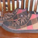 Brad Deniston Collection of Chucks  Left side views of quilted high top chucks.