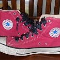 Brad Deniston Collection of Chucks  Inside patch view of raspberry red high tops.
