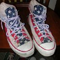 Brad Deniston Collection of Chucks  Top view of stars and bars high tops.