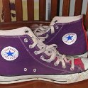 Brad Deniston Collection of Chucks  inside patch views of green, red and purple tricolor high tops.