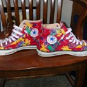 Brad Deniston Collection of Chucks  inside patch views of tropcial print high tops.