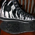 Brad Deniston Collection of Chucks  inside patch and sole views of zebra prinit high tops.