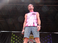 Breathe Carolina  Cooperman performs with Cute Is What We Aim For at Warped Tour in blue, folded down high tops.