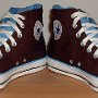 Brown High Top Chucks  Brown and Carolina blue 2-tone high tops, angled front view.