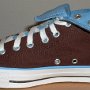 Brown High Top Chucks  Rolled down right brown and Carolina blue 2-tone high top, inside patch view.