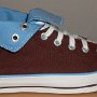 Brown High Top Chucks  Rolled down right brown and Carolina blue 2-tone high top, outside view.