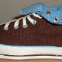 Brown High Top Chucks  Rolled down left brown and Carolina blue 2-tone high top, outside view.