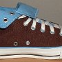 Brown High Top Chucks  Rolled down left brown and Carolina blue 2-tone high top, inside patch view.