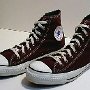Brown High Top Chucks  Chocolate brown high tops with black felt interior, angled side view.