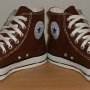 Brown High Top Chucks  Angled front view of chocolate brown high tops.