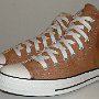 Brown High Top Chucks  Angled side view of tannin high tops.