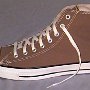 Brown High Top Chucks  Left taupe high top, outside view.